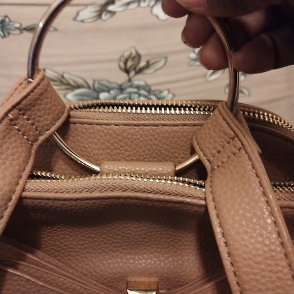 Crossi women's tan bow mini back pack w/ adjustable straps and interior pockets - Picture 9 of 12